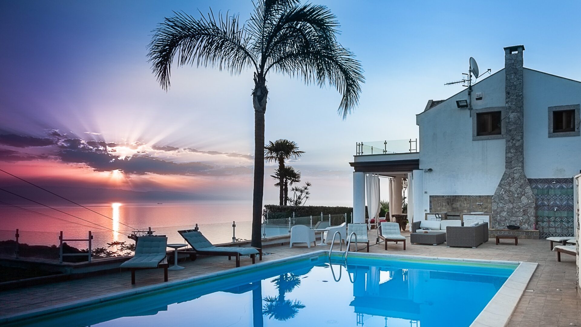 Villa Mazzarò's swimming pool at the sunset