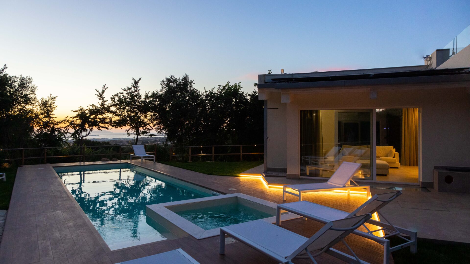 Villa Ferla Verde's pool at the sunset