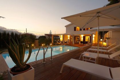 Villa Perla's pool at the sunset